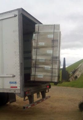 Truck door with unsecured cargo