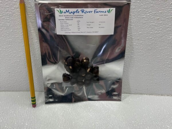 Resealable seed packet and pencil for scale